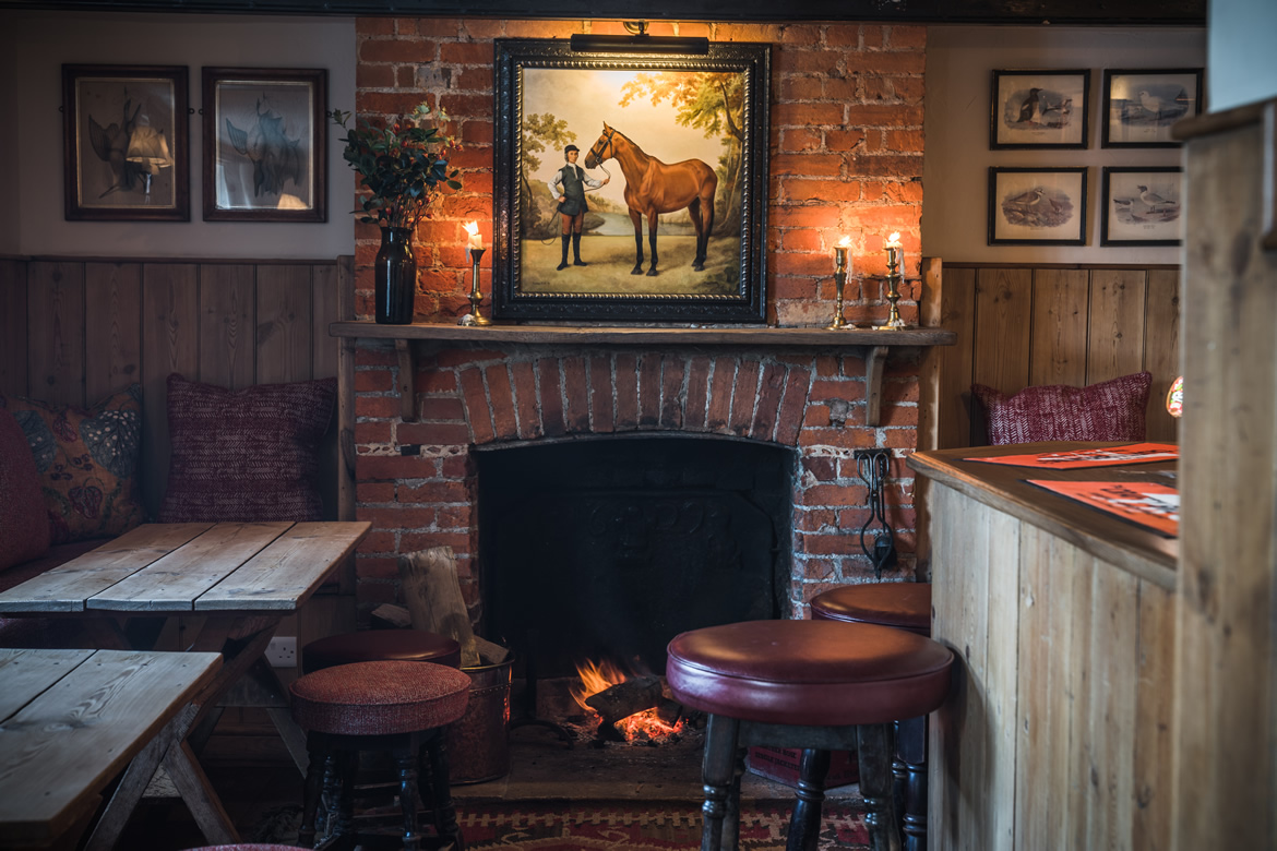 Cosy bar with real log fire